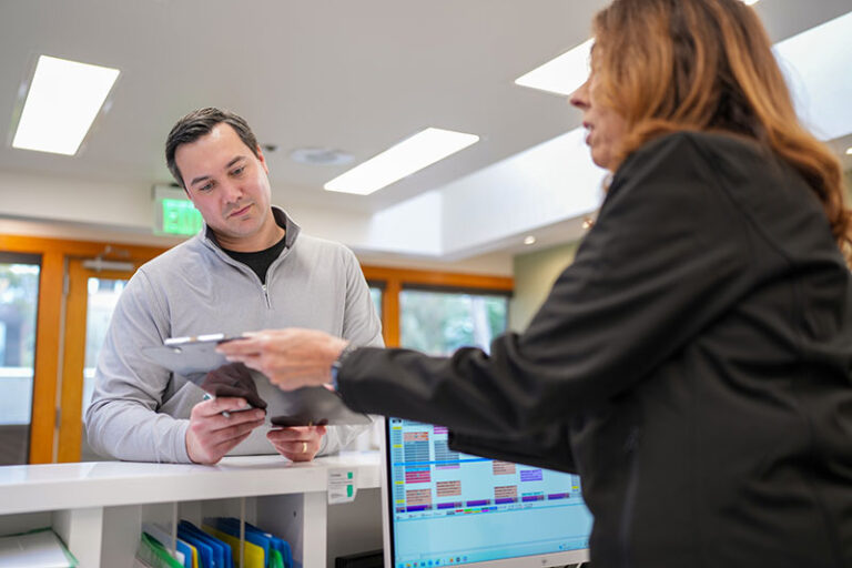 a patient checking in for their oral surgery appointment